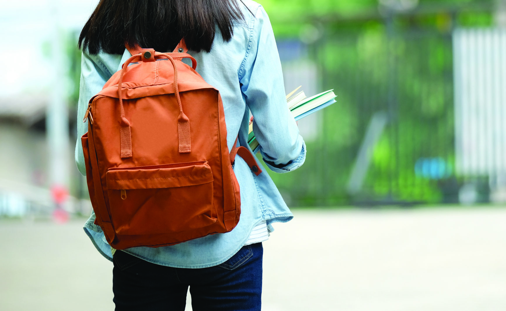 student with backpack